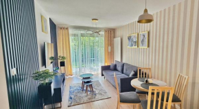 Apartament Whiteblue Kołobrzeg z dużym ogródkiem - 100 m od plaży! Whiteblue Kolberg Apartment mit großem Garten - 100 m vom Strand entfernt! Whiteblue Kołobrzeg Apartmán s velkou zahradou - 100 m od 